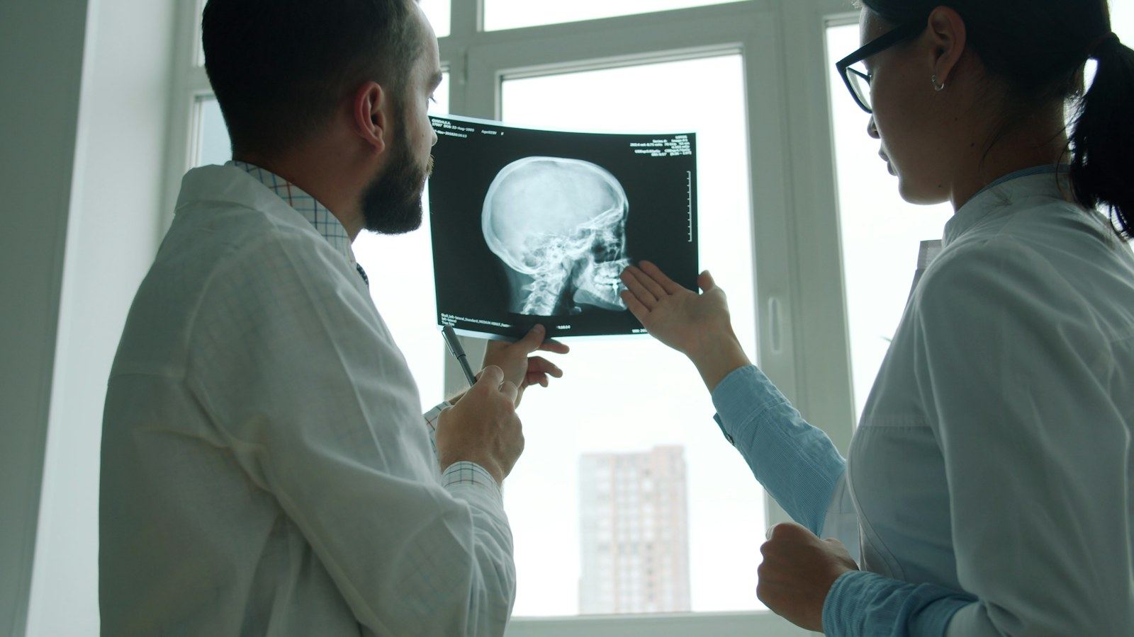 Two clinicians reviewing a scan together